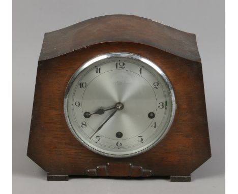 An Enfield oak cased Westminster chime mantle clock, no key.