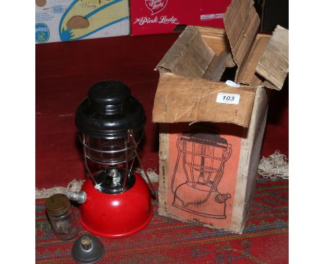 A Tilley storm light in original box.