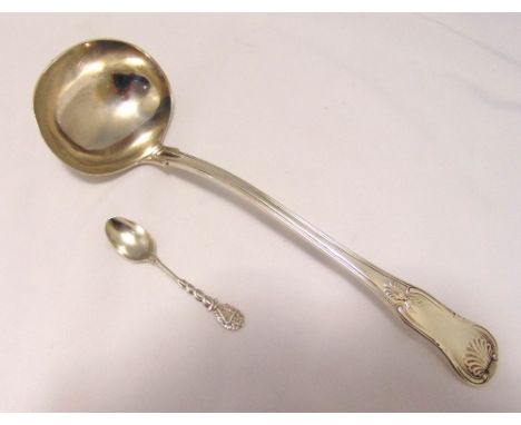 A hallmarked silver fiddle and shell soup ladle, London 1824 and a silver coffee spoon, approx total weight 280g