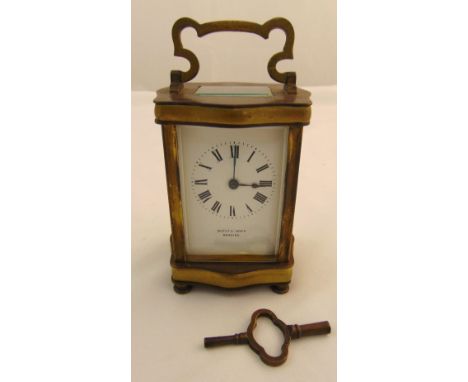 Bottley and Lewis carriage clock of customary form, white enamel dial with Roman numerals to include the key, 12cm (h)