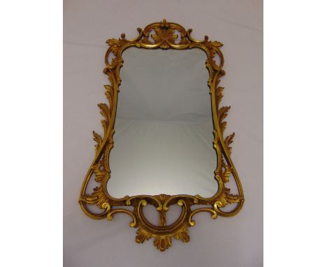 A gilt wood rectangular Rococo style wall mirror, 89.5 x 50cm