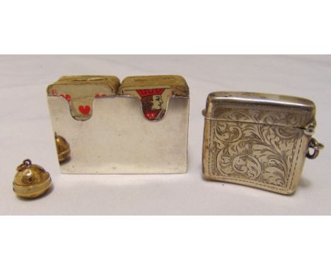 A hallmarked silver miniature playing card holder, a hallmarked silver vesta case and a gilt metal charm compass
