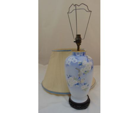 A porcelain baluster form table lamp decorated with flowers to include the shade, 40cm (h)