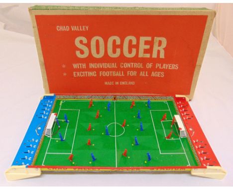 A Chad Valley Soccer game in original packaging, 60 x 32cm