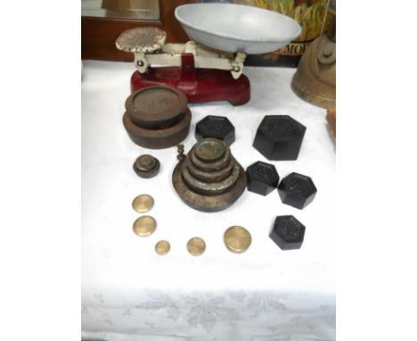 A set of scales and a quantity of weights