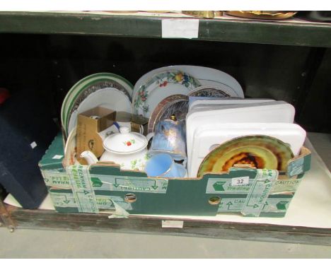 A shelf of assorted china including collector's plates