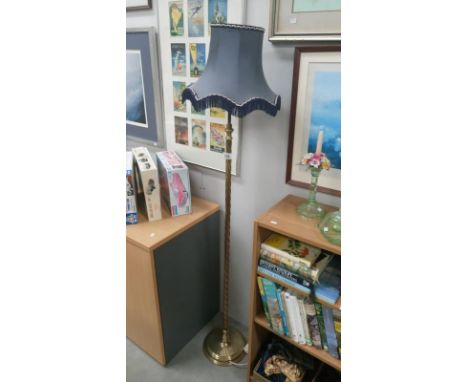 A brass standard lamp