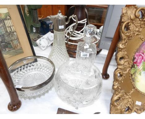 A glass decanter, glass claret jug and 2 glass bowls