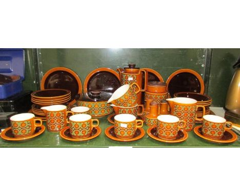 A shelf of Hornsea tea and dinner ware