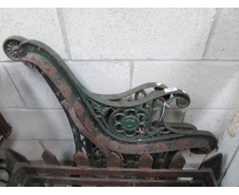 A pair of cast iron bench ends