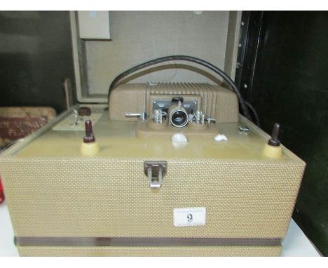 A cased vintage projector