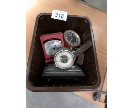 2 small clocks, a barometer and 2 wristwatches