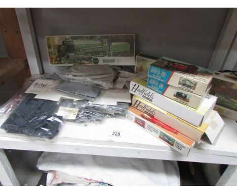 A collection of Airfix train model kits and other model kits