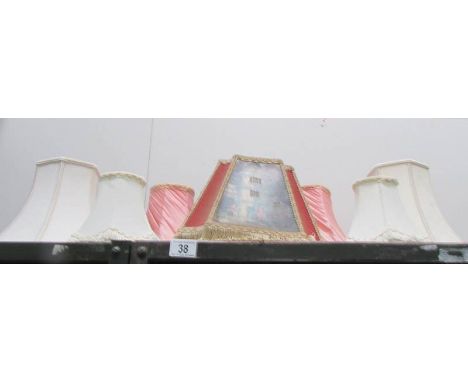 A quantity of lamp shades