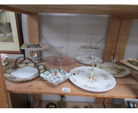 A mixed lot of cake stands, one shelf