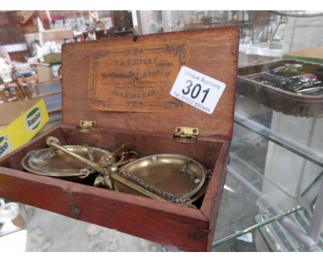 A cased set of old Avery apothecary scales