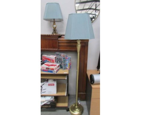 A standard lamp and a table lamp with matching shades