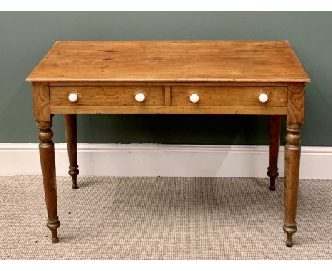 ANTIQUE PINE SIDE TABLE having twin front drawers with white ceramic knobs on turned tapering supports, 73cms H, 107cms W, 54