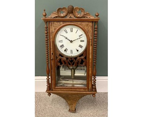 AMERICAN WALL CLOCK having a walnut case with bobbin pillars and carved crest, bell strike movement, white dial set with Roma