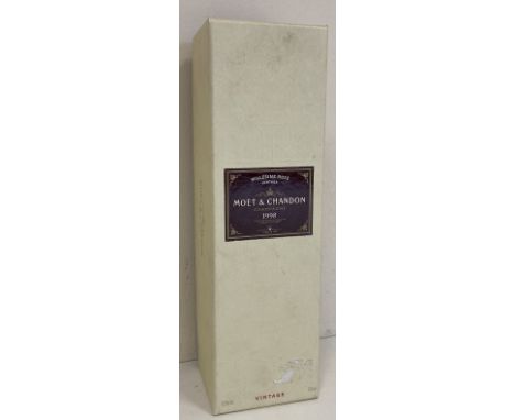 CHAMPAGNE - MOET &amp; CHANDON. A sealed presentation box featuring a bottle of Millesime Rose Vintage 1998.