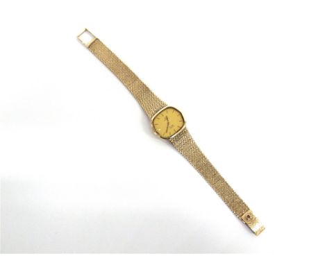 OMEGA, QUARTZ, A LADY'S 9 CARAT GOLD BRACELET WATCH  the gilt TV shaped dial with black batons and hands, push in set button,