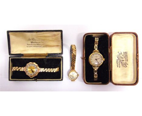 A LADY'S 18 CARAT GOLD WRIST WATCH on a metal bracelet, cased; and another similar by Rotary