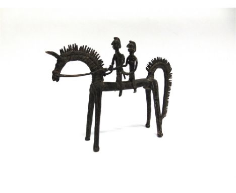 A BENIN STYLE BRONZE GROUP  of a horse and two riders, 22.5cm high
