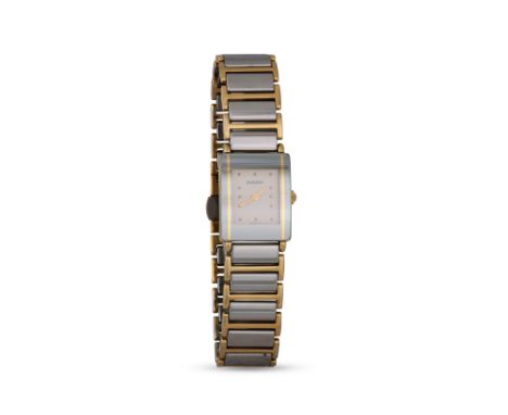 A LADY'S RADO WRISTWATCH, silvered face with dot markers, titanium bracelet strap