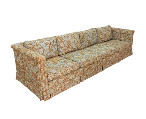 Cypriot, Pambos Savvides very elegant four seater sofa, low back, loose cushions, upholstered in a floral modern pattern fabr