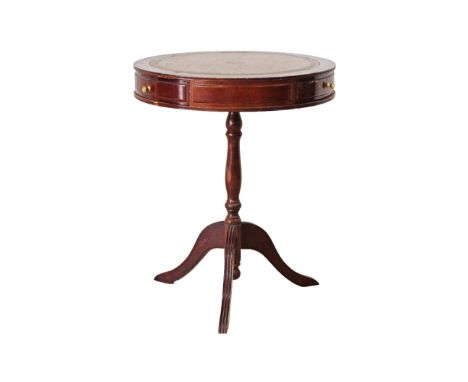 Cypriot, Pambos Savvides Regency style drum side table, with leather inset top, three frieze drawers, on turned tripod base. 