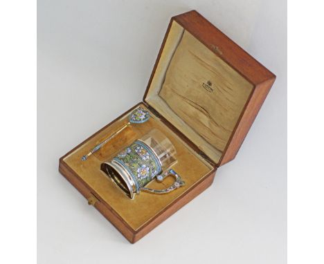 A Russian silver and shaded cloisonné enamelled multi coloured tea holder with clear glass and spoon, of cylindrical form wit