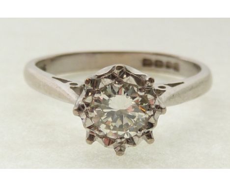 SOLITAIRE DIAMOND RING, 0.32ct approx., VS, faint to light yellow, illusion set to the 18ct white gold band, London 1992, I, 