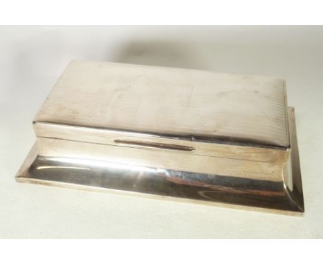 ENGINE TURNED SILVER LARGE TABLE CIGARETTE BOX, with concave sides, monogrammed, London 1924, 9" x 5" x 2" (22.8cm x 12.7cm x