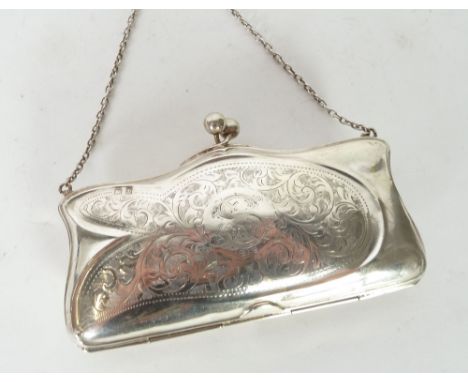 AN EARLY TWENTIETH CENTURY LADY'S SILVER PURSE, engine with foliate scrollwork centering a monogram and date 1919, Birmingham