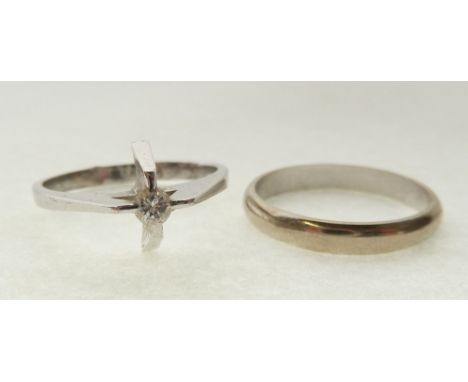 SOLITAIRE DIAMOND RING, 0.07ct approx., in extended cross claw setting, to the white metal band (tests as platinum), L, 2.5g 