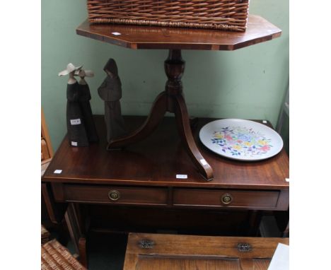 A reproduction sofa table with two drawers and twin flaps and a hexagonal low table