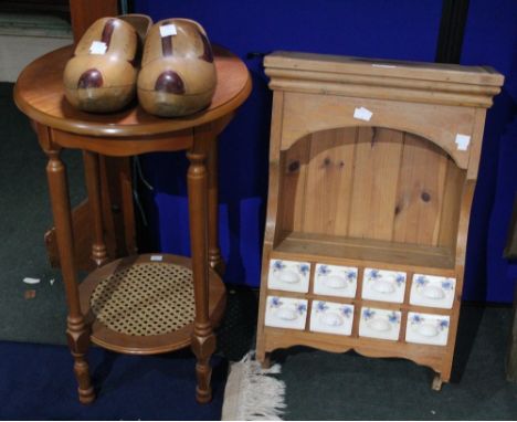 A pine shelf unit with ceramic spice drawers, a small occasional table & a paid of wooden clogs