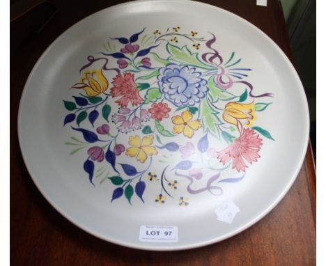 A floral patterned Poole Pottery ceramic charger plate