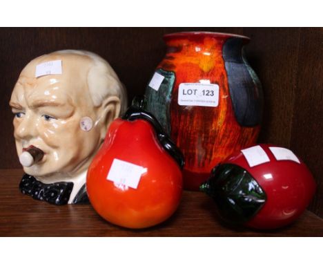 A small collection to include Winston Churchill jug, Poole style vase and two items of fruit (4)