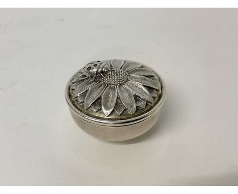 Asprey silver box and cover, the cast silver lid with a sunflower and ladybird, made and retailed by Asprey, London 1998, 5.5