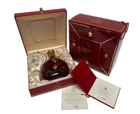 One bottle, Louis XIII de Rémy Martin - Grande Champagne Cognac, housed in a Baccarat crystal decanter with fleur-de-lis moti