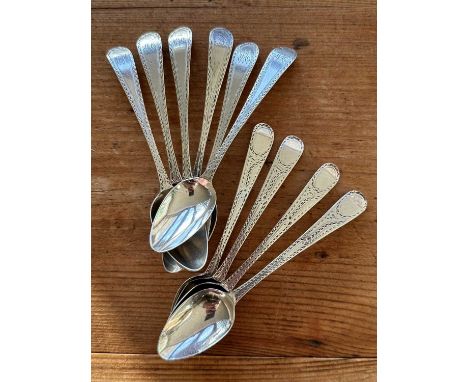 Set of six George III silver bright cut teaspoons (London 1788) and four similar examples (London 1786), all at 3.3ozs