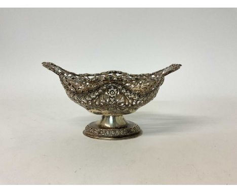 Victorian silver bonbon dish, of lozenge form, on footed base, with pierced swag decoration, Chester 1890 (George Nathan &amp
