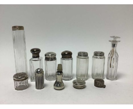 Collection of Victorian and later, silver topped toiletry bottles and other items (Various dates and makers)