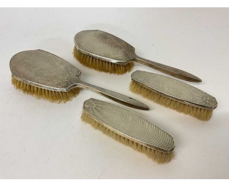Four peice silver dressing set with engine turned Art Deco decoration (Birmingham 1936-37)