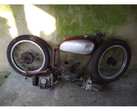 A 1950 BSA B31 restoration project, engine number ZB31 4313, maroon. Consisting of a frame, petrol tank, engine (lacks cylind