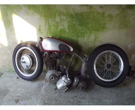 A 1947 BSA B31 restoration project, engine number XB31 2303, maroon. Consisting of a frame, engine, wheels, gearbox, rear mud