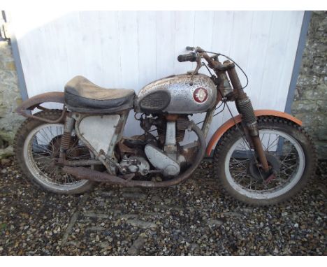 A 1951 BSA B33 twin shock scrambler restoration project, engine number ZB33 9064, blue and chrome. This twin shock scrambler 