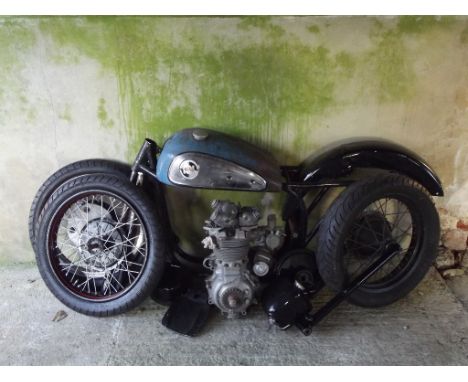 A Triton restoration project, engine number T100 438131, blue. Consisting of a featherbed frame (powder coated), petrol tank,
