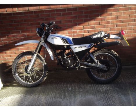 A 1979 Yamaha DT175 MX, registration number BAM 98V, frame number 2K4017184, engine number 2K417184, white and blue. This par